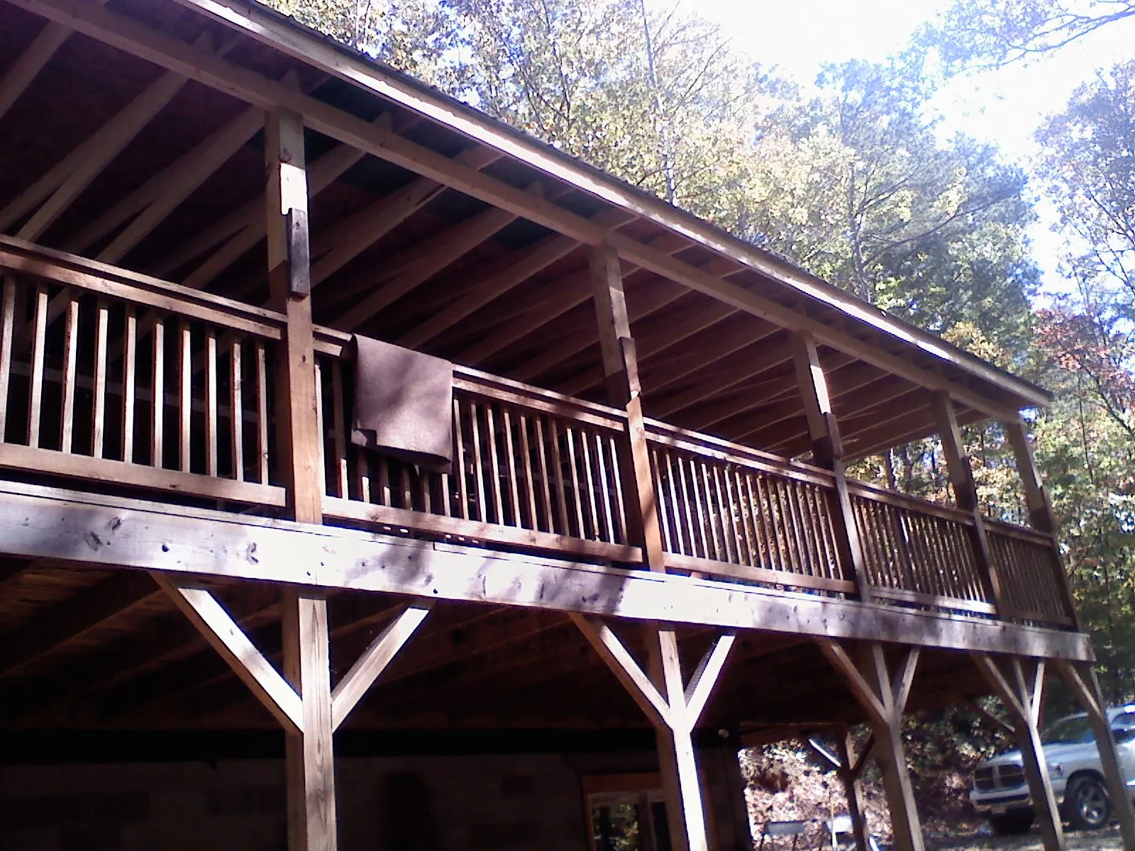 Timber framing under a new elevated porch and deck — Roof Leak Repair in Saint Regis by Roofing Brothers